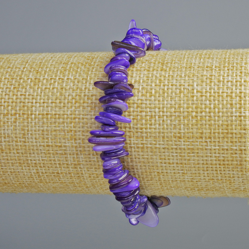 Bransoletka tonowana fioletową masą perłową, drobinki, średnica 10 x 2 mm, długość 18 cm, elastyczna