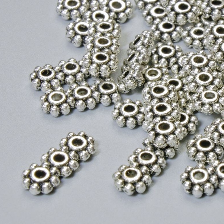 Rozdzielacz koralikowy na 3 nici, średnica 10,5×4 mm, otwór 1,2 mm, kolor metalu: srebrzysty, 22 szt.