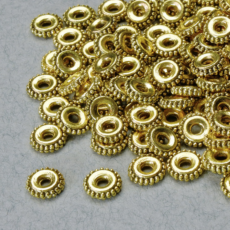 Okucia koralik-wkładka, wymiary 1,5×6 mm, otwór 6 mm, złoty kolor metalu, opakowanie 20 g ± 105 szt.