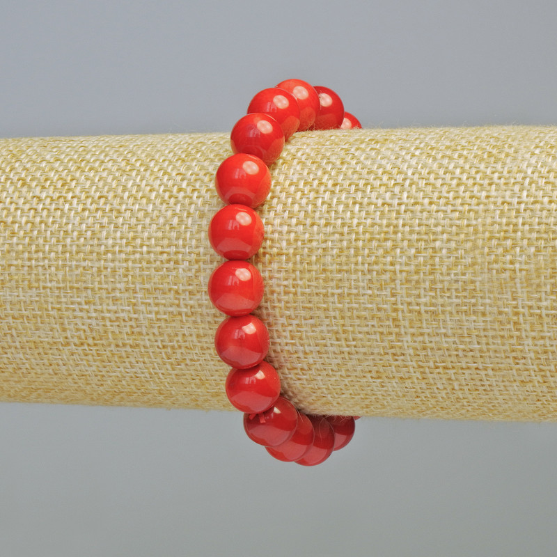 Bransoletka z naturalnego koralu, gładkie kulki, średnica ok. 10 mm +/- (na gumce), długość 18 cm+