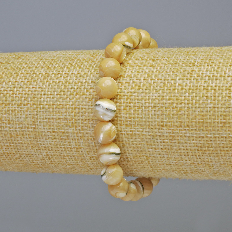 Bransoletka z naturalnej masy perłowej, gładka kulka, średnica 8,5 mm ± (elastyczna), długość 18 cm+