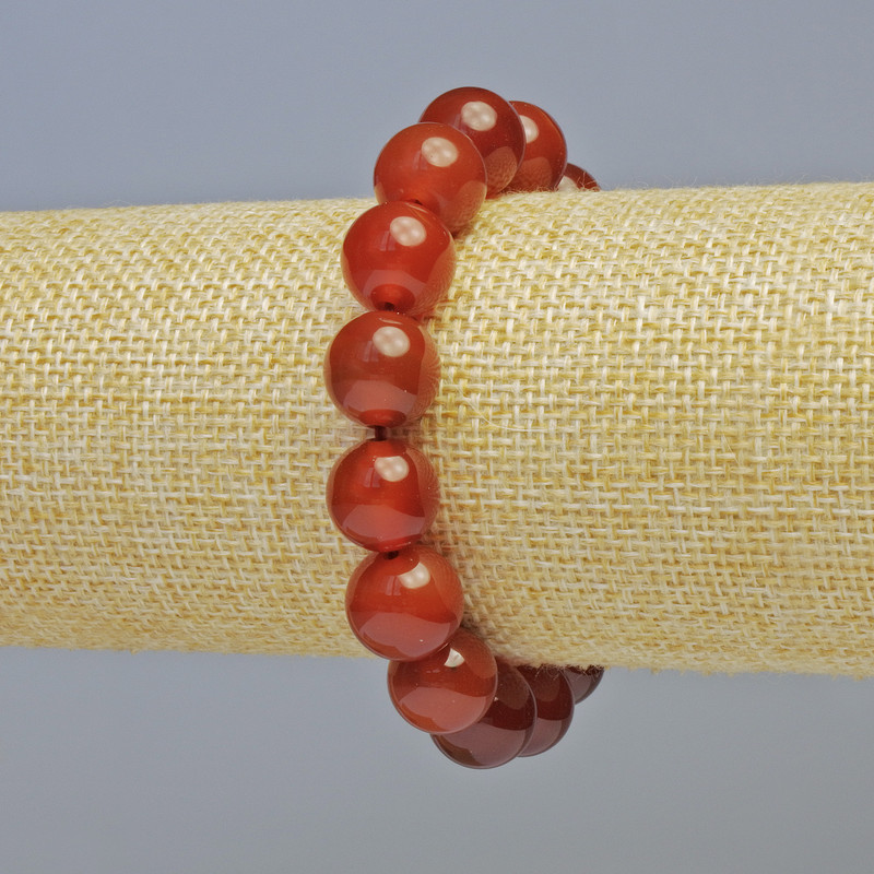 Bransoletka z naturalnego karneolu, gładkie kuleczki o średnicy 12 mm ± (elastyczna baza), długość 18 cm+