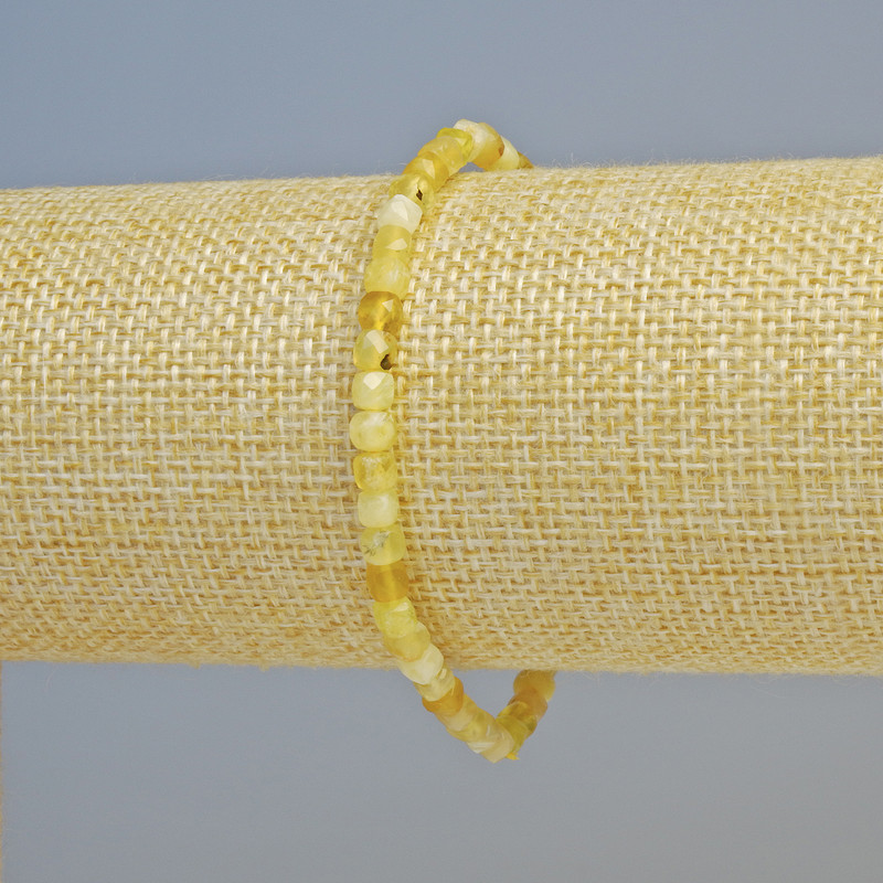 Bransoletka z żółtym opalem, fasetowane kostki z naturalnego kamienia o boku 4 mm ± (rozciągliwa), długość 18 cm+