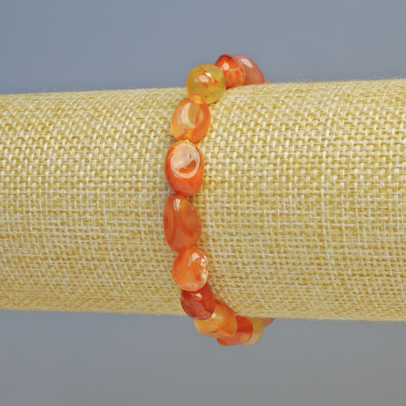 Bransoletka z naturalnego karneolu, fasetowana, średnica 8×10 mm ± (rozciągliwa), długość 18 cm+