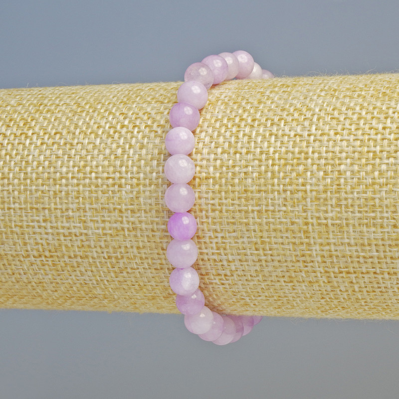 Bransoletka z kunzytu (sztuczny) gładka kulka, średnica 6 mm ± (na elastycznej bazie), długość 18 cm+