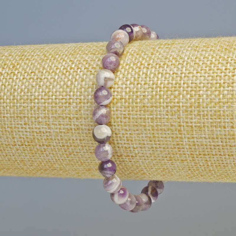 Bransoletka z naturalnym ametystem, gładkie kuleczki o średnicy 6,5 mm ± (elastyczna), długość 18 cm+