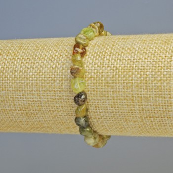 Bransoletka z grosularu (zielony granat) — naturalny kamień fasetowany, średnica 7 mm ± (rozciągana), długość 18 cm+