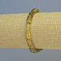 Bransoletka z grosularu (zielony granat) – naturalny kamień szlifowany, średnica 7×11 mm ± (rozciągana), długość 18 cm+