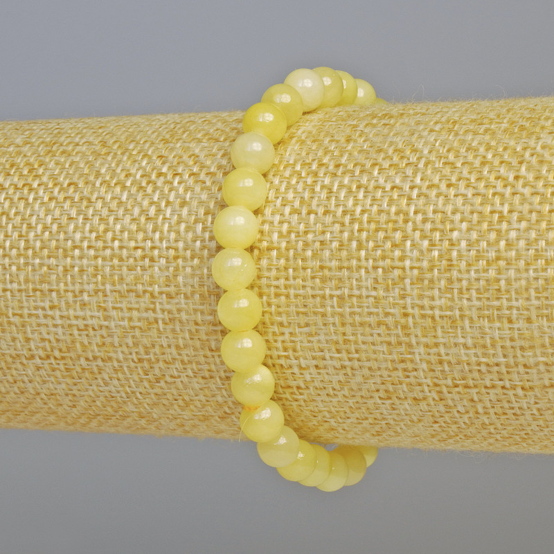 Bransoletka z sztucznego cytrynu (gładkie kuleczki), średnica 6 mm ± (rozciągana), długość 18 cm+