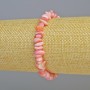 Bransoletka z tonowanej różowej masy perłowej – drobinki, średnica 7×2,5 mm ± (rozciągliwa), długość 18 cm+