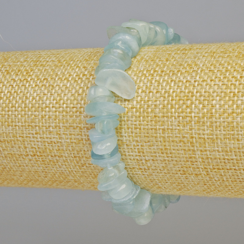 Bransoletka z akwamarynu, naturalny kamień – drobne kawałki, średnica 11×3 mm ± (rozciągany), długość 18 cm+