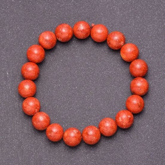 Bransoletka z koralu gąbczastego – gładkie kulki, średnica 12 mm, długość 18 cm (rozciągliwa)