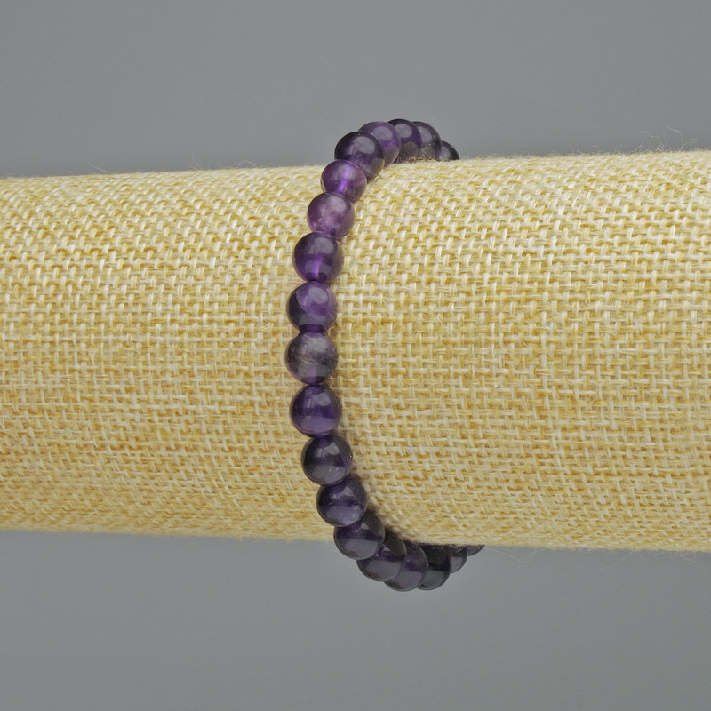 Bransoletka z naturalnego ametystu, gładkie kulki, średnica 6,5 mm ± (rozciągana), długość 18 cm