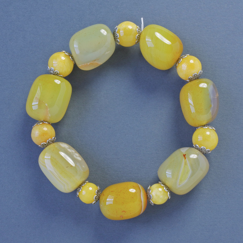 Bransoletka z żółtego agatu, owalna, średnica 16×20 mm ±, kuleczki 10 mm ±, długość 18 cm ±, elastyczna