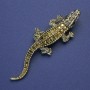Broszka-wisiorek Krokodyl z złotymi cyrkonami, złoty kolor metalu, 75×21 mm+