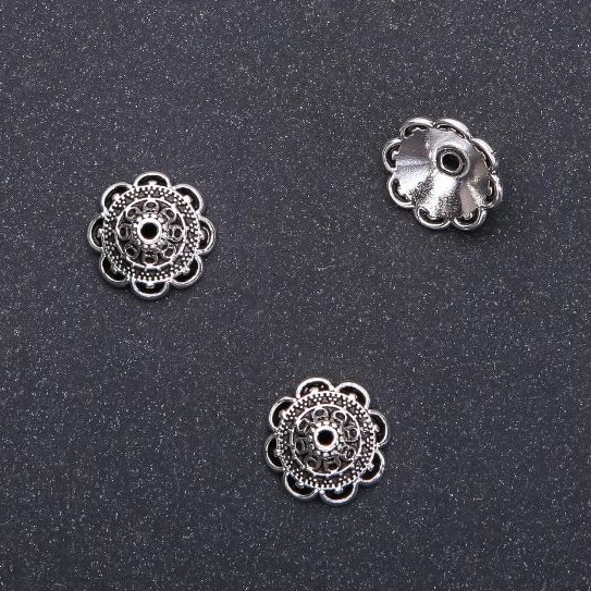 Końcówka do biżuterii, średnica 14×6 mm, wewnętrzna średnica 1,5 mm, opakowanie 20 g, 16 szt. (+-)