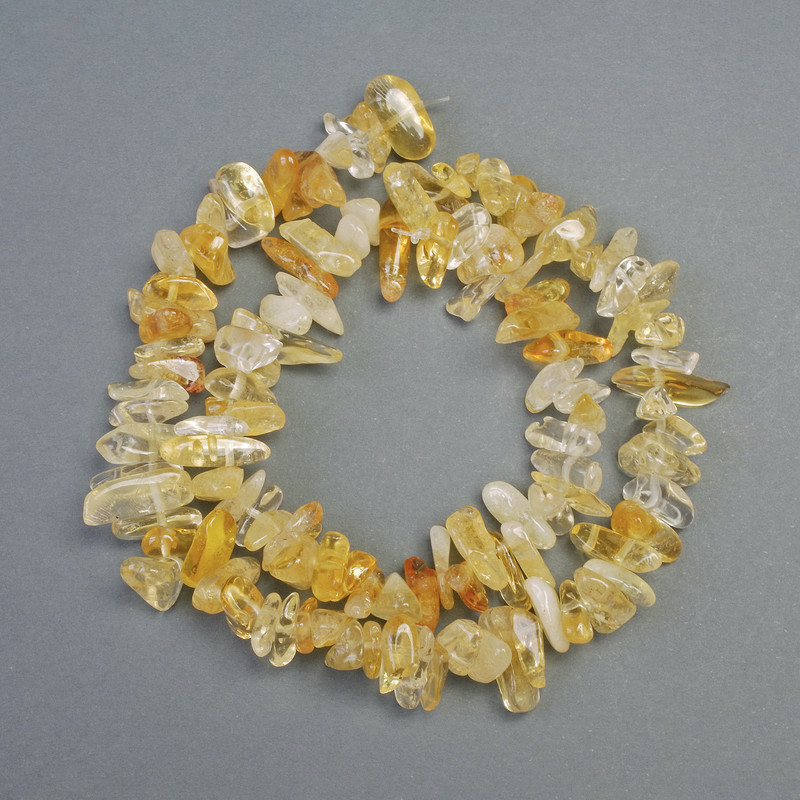 Koraliki z cytrynu, naturalny kamień — kawałki, średnica około 14×6 mm, długość około 40 cm, na żyłce