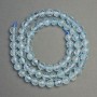Koraliki z naturalnego kamienia Topaz fasetowana kulka, średnica 6,5 mm+-, długość 39 cm+
