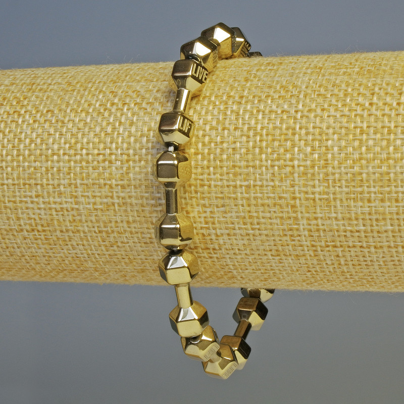 Bransoletka hematyt w kształcie hantli, kolor jasny brąz, średnica 21×7 mm, długość ok. 18 cm, elastyczna