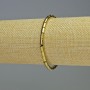 Bransoletka z hematitu w kolorze złotym, cylindryczna, długość 18 cm, elastyczna