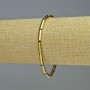 Bransoletka z hematitu cylindryczna, kolor złoty, średnica 12×4 mm, długość 18 cm, elastyczna
