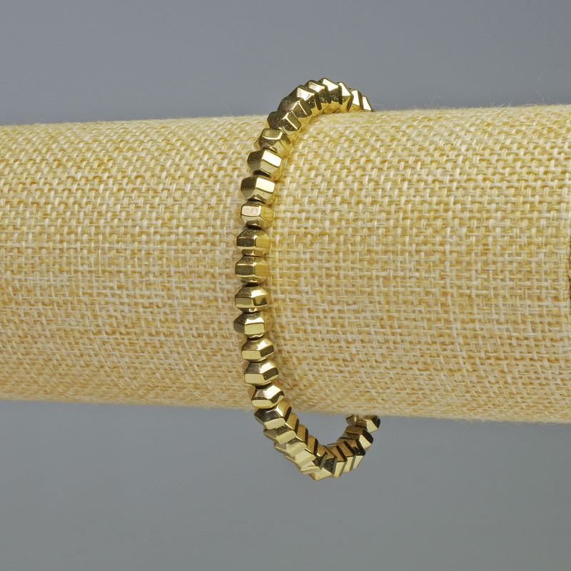 Bransoletka hematyt fasetowane rondelki w kolorze złotym, średnica 6×4 mm, długość 18 cm, na elastycznej gumce