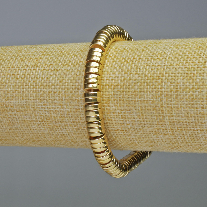 Bransoletka z wstawkami hematitu w formie rondeli w kolorze złotym, średnica 8×2 mm, długość 18 cm, elastyczna