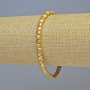 Bransoletka z hematitu w kształcie kostek o kolorze matowego złota, o wymiarach około 4×4 mm, długość 18 cm, elastyczna