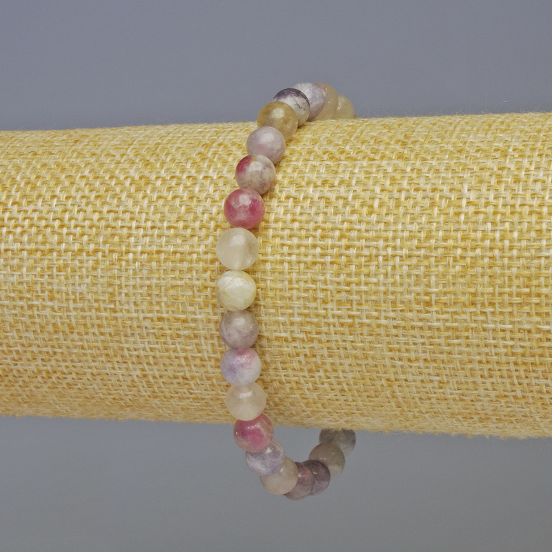 Bransoletka z różowym turmalinem, gładkie kuleczki, średnica około 6 mm, długość 18 cm, elastyczna