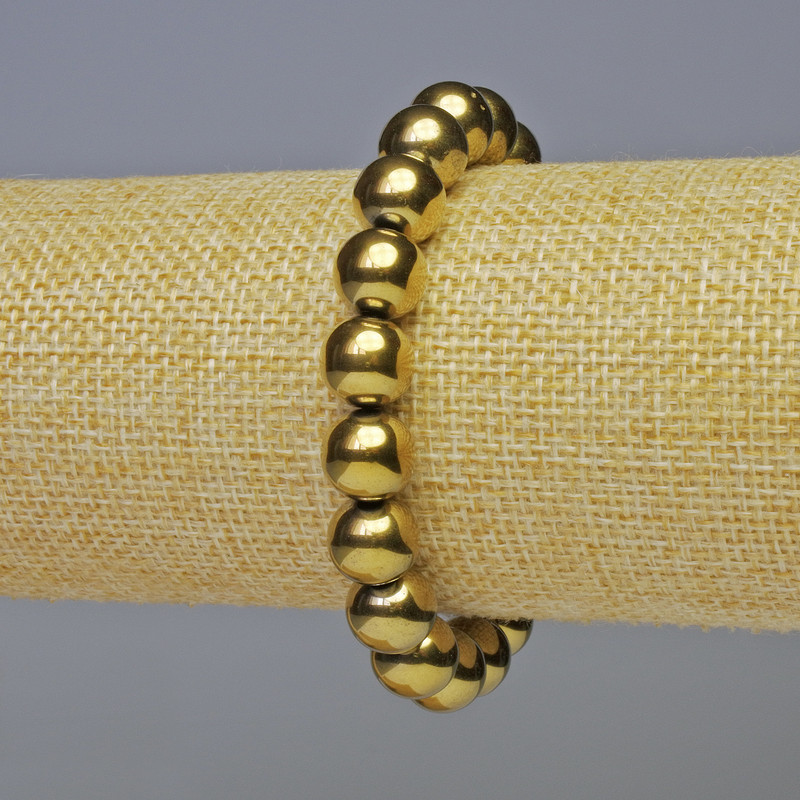 Bransoletka hematyt gładkie kulki, kolor złoty, średnica 10 mm ±, długość 18 cm ±, elastyczna