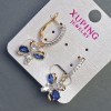 Kolczyki Xuping z niebieskimi kamieniami 30×12 mm pozłacane 18K