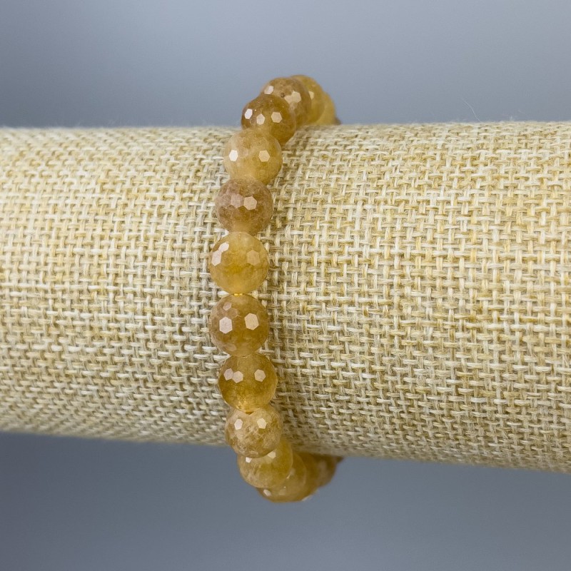 Bransoletka cytrynowa z fasetowanymi kulkami 8 mm+-, długość 18 cm+-, elastyczna