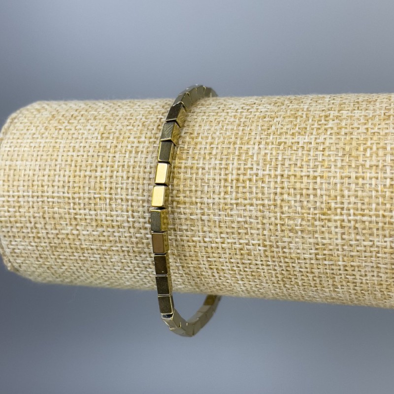 Bransoletka z hematytu w złocistym kolorze, prostokątne koraliki, średnica 5×3 mm, długość 18 cm, na elastycznej gumce