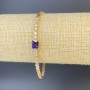 Bransoletka Xuping z białymi kryształami i fioletowym kamieniem, grubość 3 mm, długość 19 cm, pozłacana