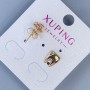 Kolczyki sztyfty Xuping „Ząb” z białym kryształem, średnica 9×8 mm, pozłacane 18K