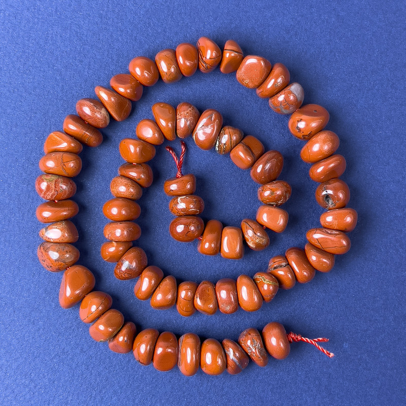 Koraliki z czerwonego jaspisu, fasetowane, 10×6 mm ±, na nitce, długość 40 cm+
