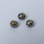 Koralik cloisonné czarna emalia, średnica 8 mm, otwór 1,5 mm, złoty kolor metalu, 1 szt