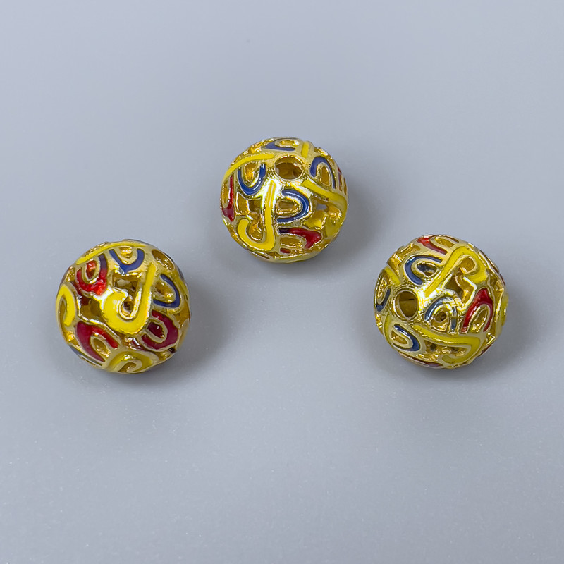 Koralik Cloisonné czerwony, żółty i niebieski, emalia, średnica 10 mm, otwór 2 mm, złoty kolor metalu, 1 sztuka
