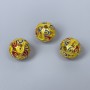 Koralik Cloisonné czerwony, żółty i niebieski, emalia, średnica 10 mm, otwór 2 mm, złoty kolor metalu, 1 sztuka