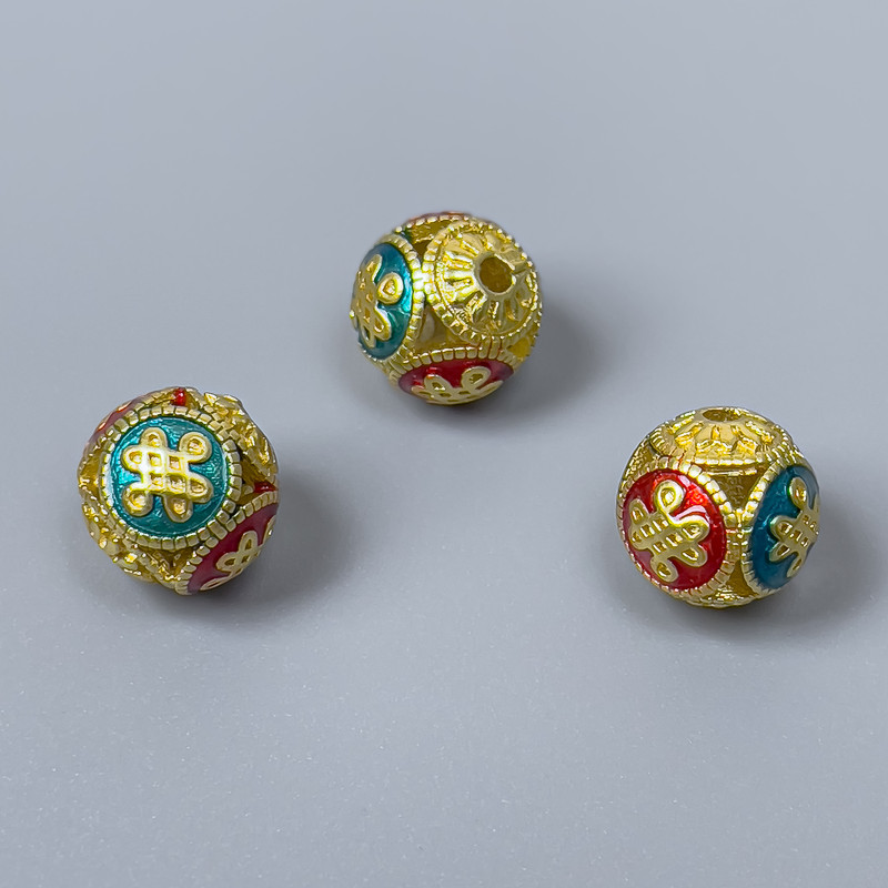 Koralik Cloisonné czerwono-turkusowy z emalią, średnica 10 mm ±, otwór 1,8 mm, złoty kolor metalu, 1 szt.