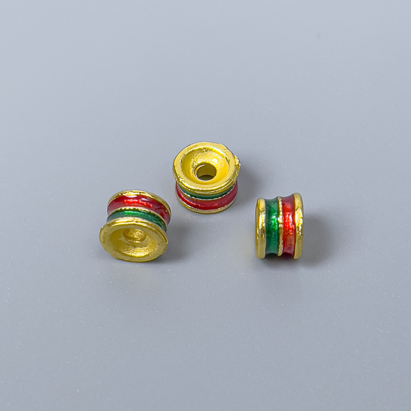 Koralik Cloisonné rondel czerwono-zielony, emalia, średnica 6×4 mm ±, otwór Ø2 mm, kolor metalu złoty, 1 szt.