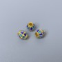 Koralik cloisonné niebiesko-błękitny, emalia, średnica 6×7 mm, otwór 2–3 mm, złoty kolor metalu, 1 szt.