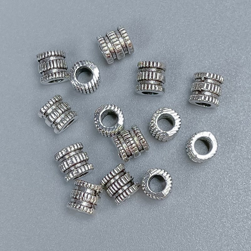 Koralik-wstawka kolor metalu srebro, średnica 5×5 mm ± otwór, średnica 3 mm ± opakowanie 40 szt.