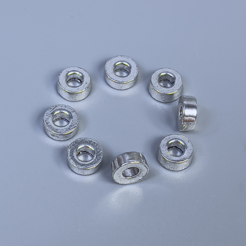 Okucia do biżuterii — koralik-wstawka w kolorze srebra, średnica 6×2,5 mm+- otwór 2,8 mm+- opakowanie 40 szt.