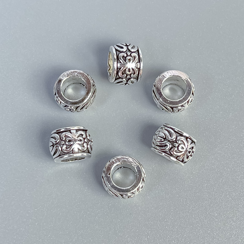 Koralik-wstawka, kolor metalu: srebro, wymiary 7×6 mm, otwór Ø około 3 mm, opakowanie 20 g (~25 szt.)