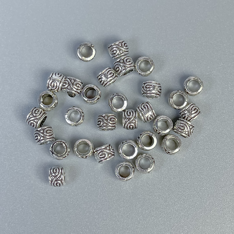 Koralik-wstawka, kolor metalu srebro, średnica 3×4 mm, otwór ~2,5 mm, opakowanie 20 g (~150 szt.)