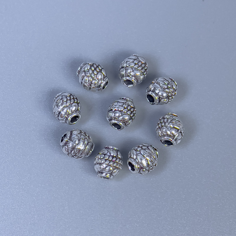 Koralik-wstawka o kolorze srebra, średnica 6×5 mm, otwór 1,5 mm, opakowanie 20 g (~50 szt.)