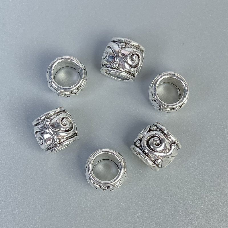 Koralik-wkładka kolor metalu srebrny, średnica 9×8 mm ± otwór, średnica 6 mm ± opakowanie 20 g (~16 szt.)
