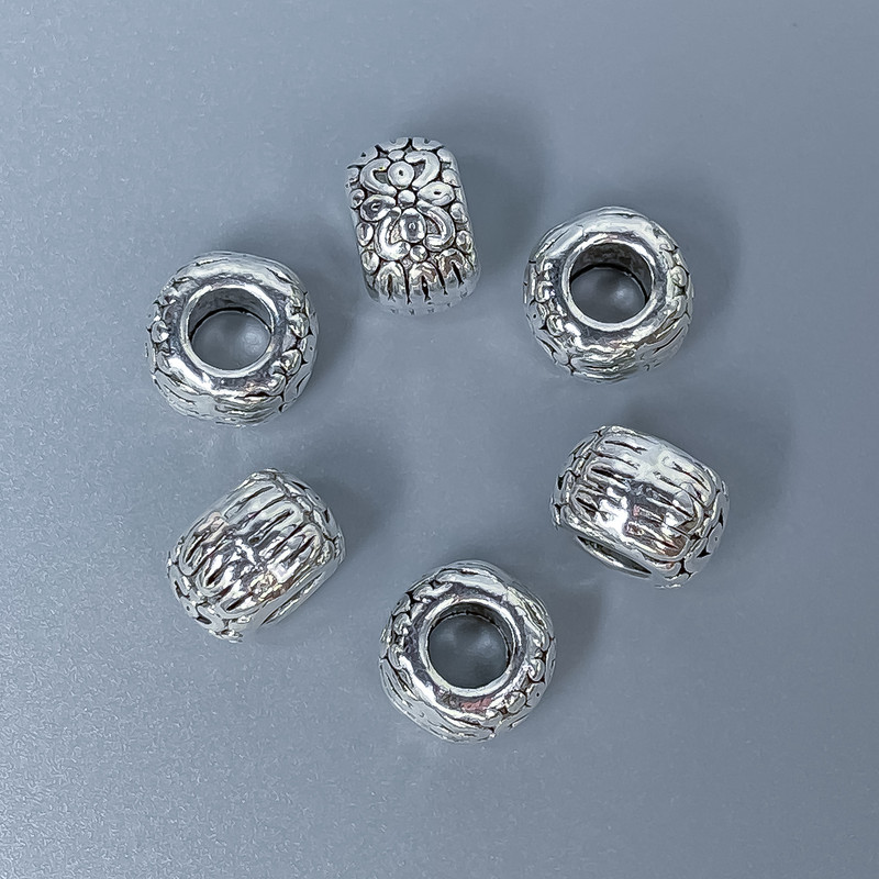 Koralik-wstawka kolor metalu: srebrny, średnica 10×7 mm ± otwór, średnica 5 mm ± opakowanie 20 g (~10 szt.)