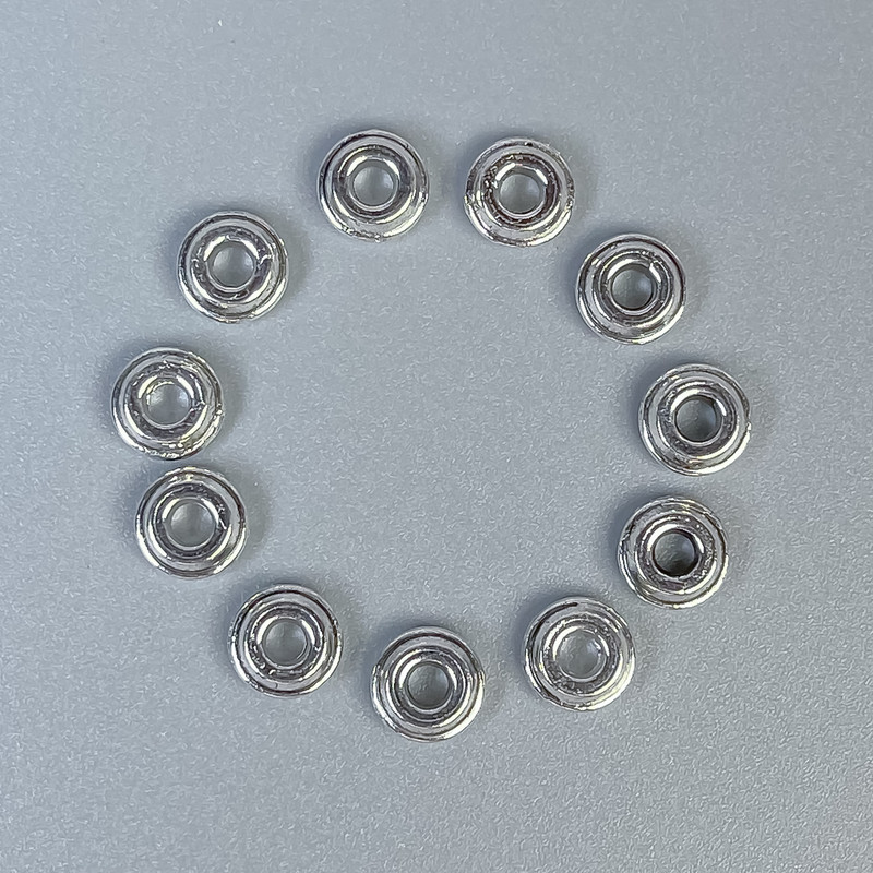 Wstawka koralikowa, kolor metalu srebrny, średnica 6×2,5 mm, otwór 2,5 mm, opakowanie 20 g (~77 szt.)